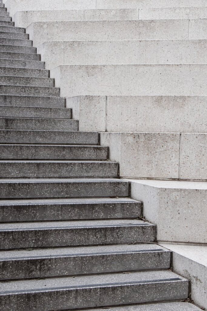 Concrete staircase captured in Melbourne, showcasing urban architectural design.